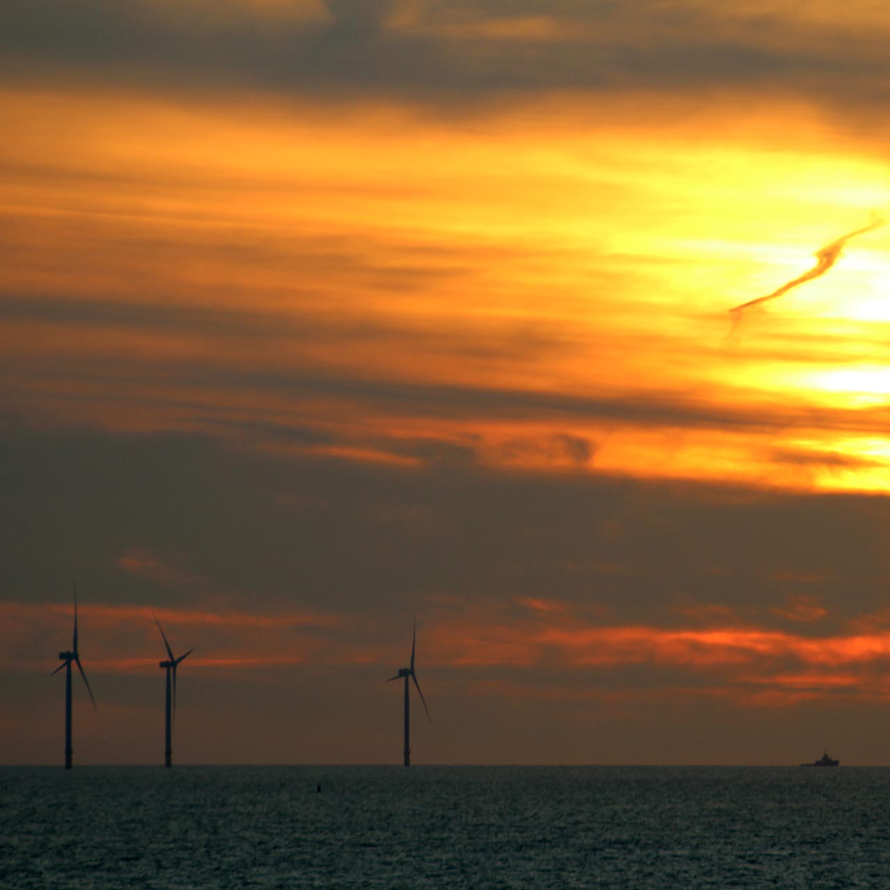 Windmolens ondergaande zon
